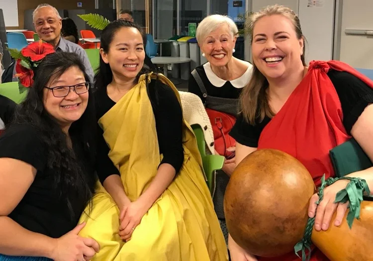A group photo of some of the hula instructors and participants